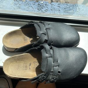 Birkis black leather clogs